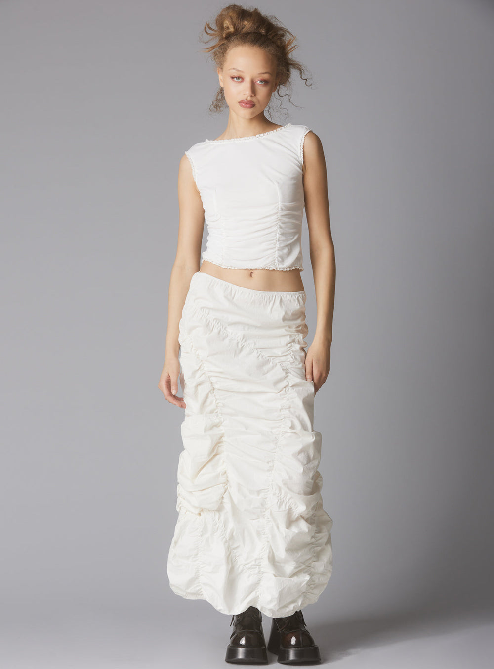 Sleeveless Top With Wide Neck & Ruffled Trim in - White | UNIF Clothing online