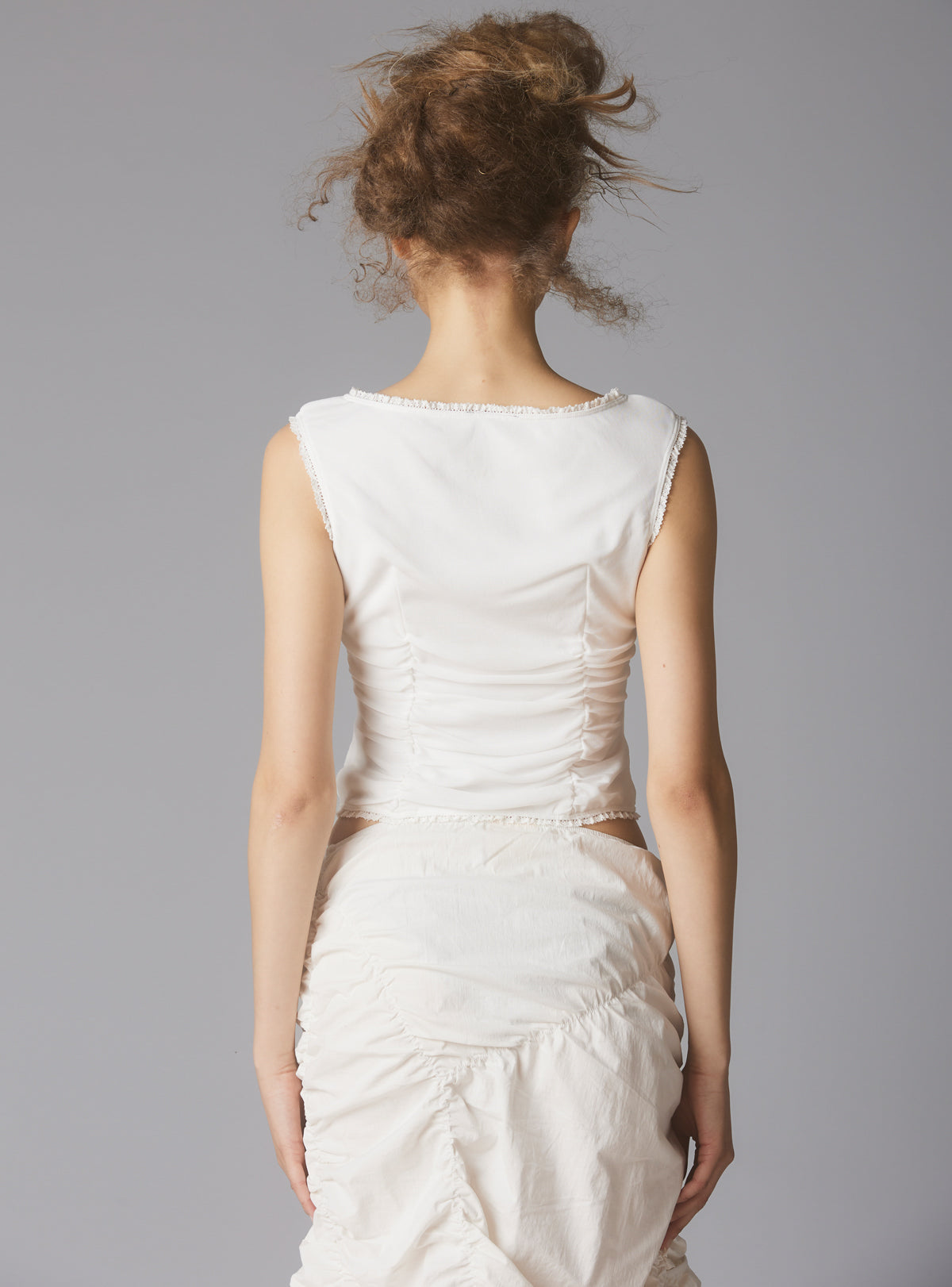 Sleeveless Top With Wide Neck & Ruffled Trim in - White | UNIF Clothing online