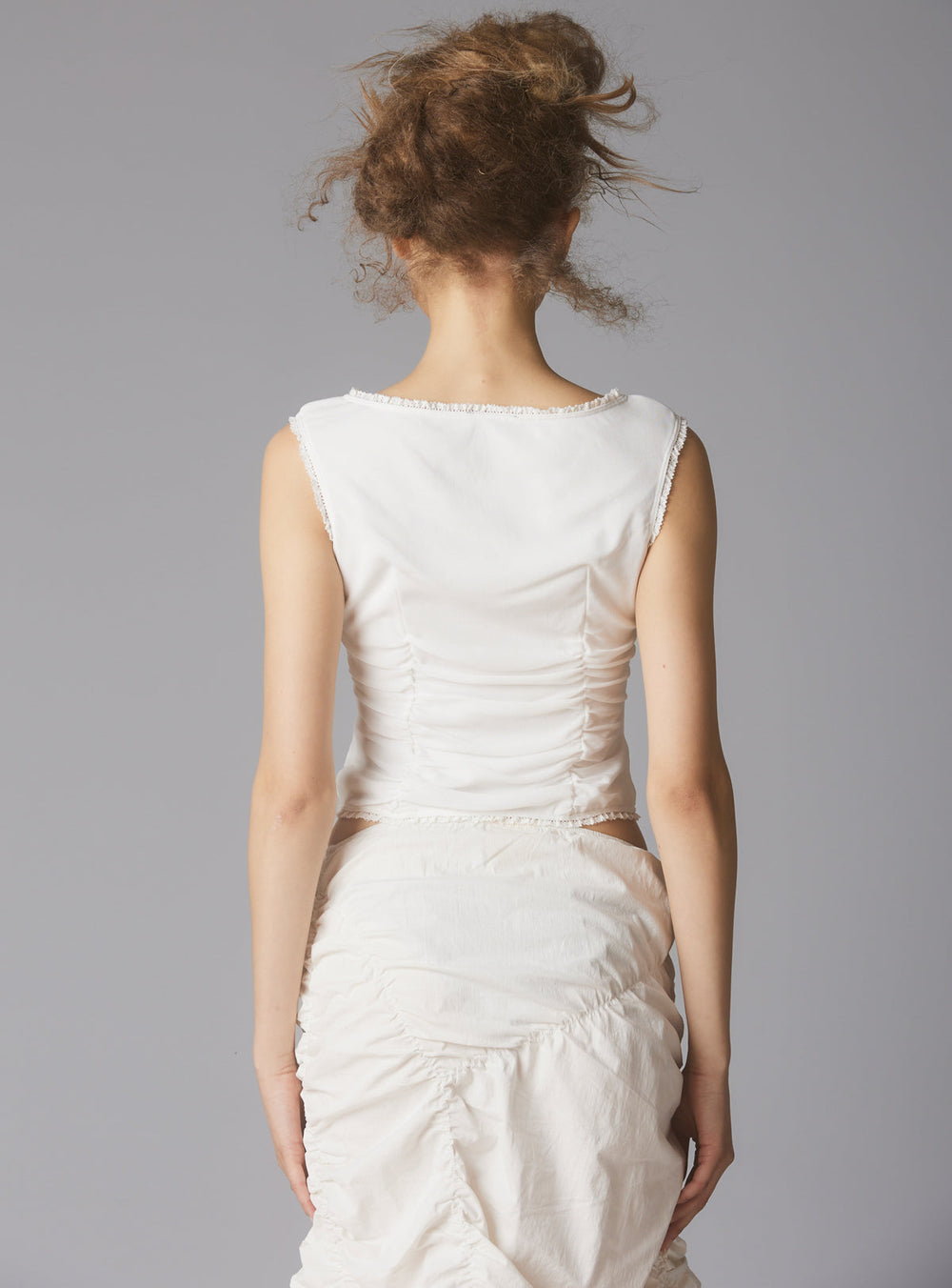 Sleeveless Top With Wide Neck & Ruffled Trim in - White | UNIF Clothing online