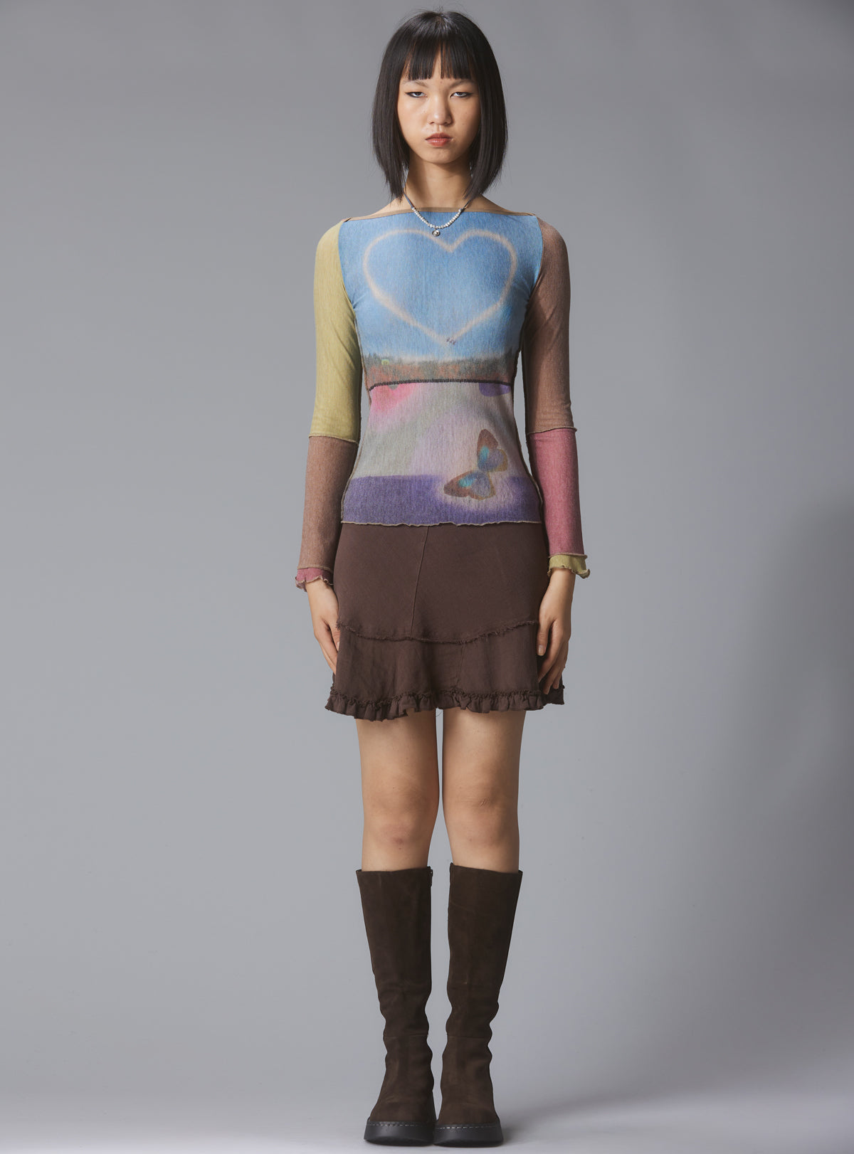 Skye Top Y2K allover-print mesh top with custom artwork - Multi | UNIF Clothing near me