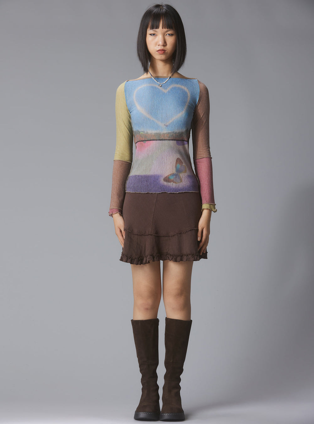 Skye Top Y2K allover-print mesh top with custom artwork - Multi | UNIF Clothing near me