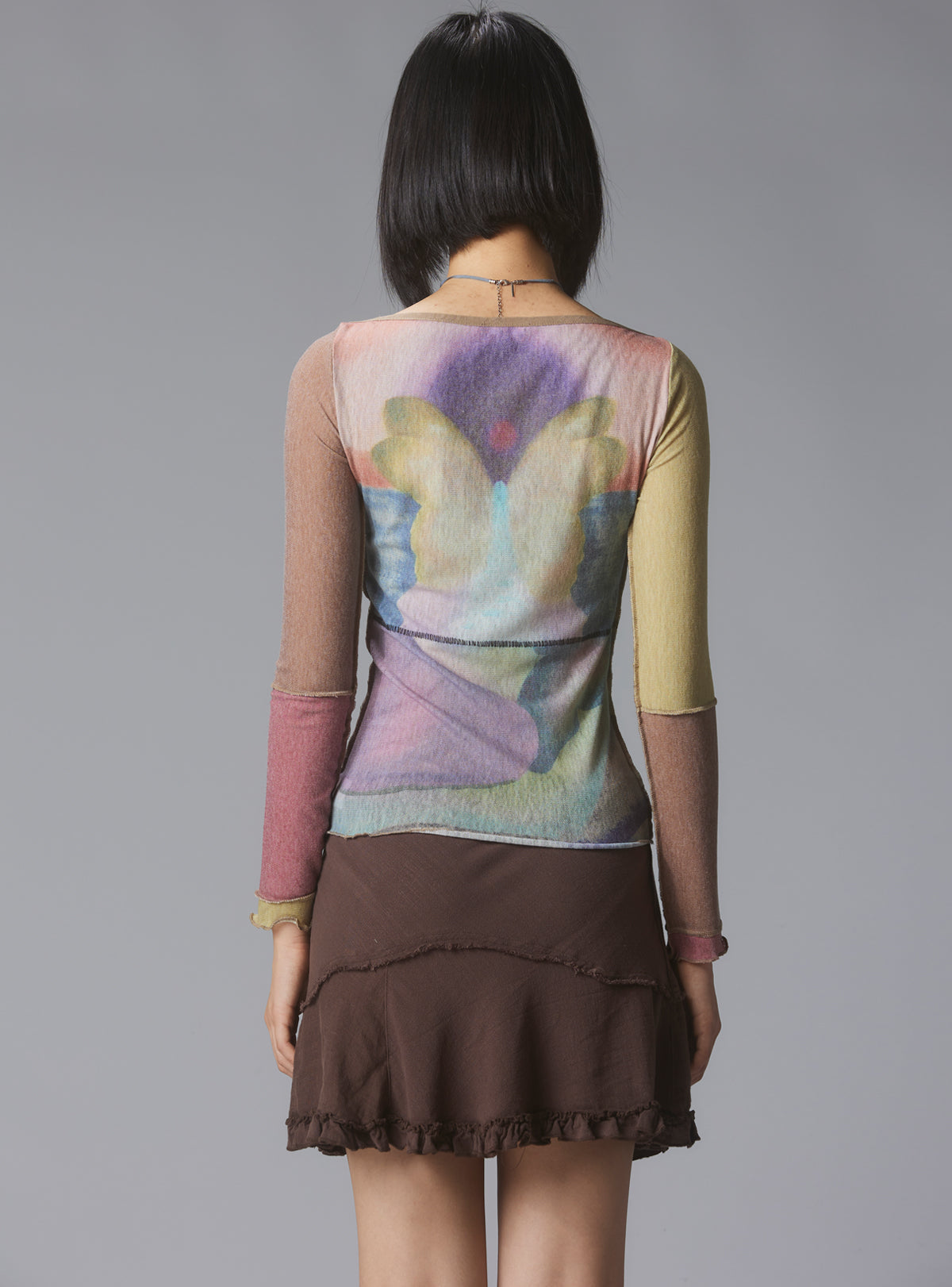 Skye Top Y2K allover-print mesh top with custom artwork - Multi | UNIF Clothing near me